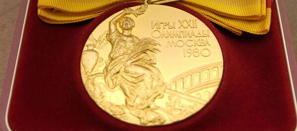 Золотая медаль Игр XXII Олимпиады (г.Москва, 1980г.) - экспонат коллекционного фонда Гохрана России. - Sputnik Армения