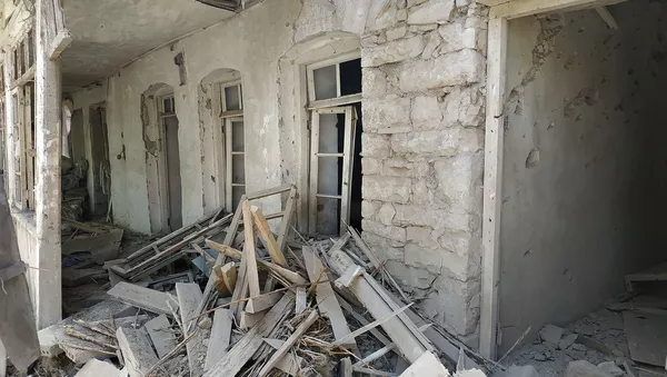 Пострадавший от обстрелов жилой дом в селе Неркин Кармирахпюр, Тавуш