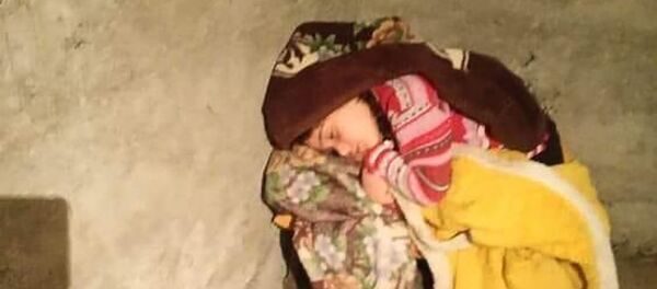 Ребенок спит в укрытии - Sputnik Армения