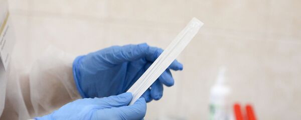 Медсестра во время теста на коронавирус Медсестра во время теста на коронавирус - Sputnik Արմենիա