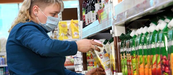 Сотрудница супермаркета. - Sputnik Армения