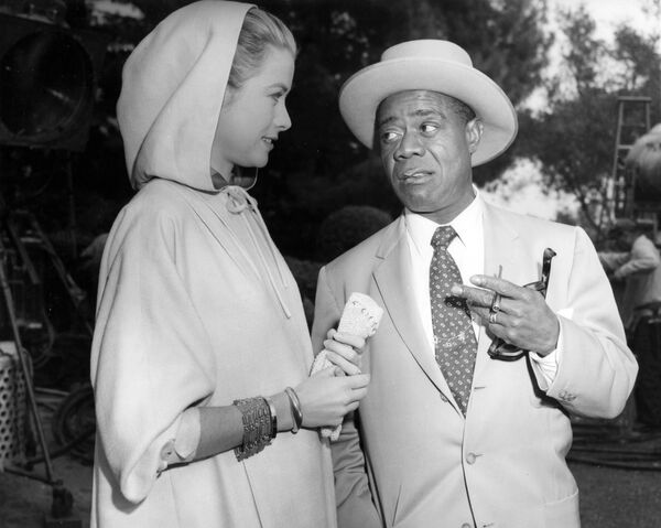 Актриса Грейс Келли с Луи Армстронгом во время съемок в Лос-Анджелесе, 1956 год - Sputnik Армения