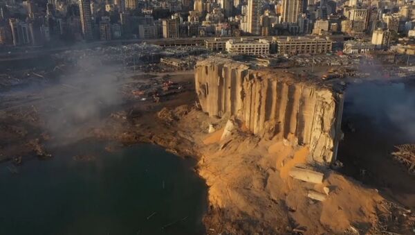 Беспилотник облетел руины зданий, разрушенных мощным взрывом в Бейруте - Sputnik Армения