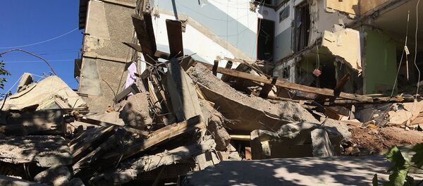 Спасатели на месте взрыва газа на улице Райниса (26 августа 2020). Еревaн - Sputnik Армения