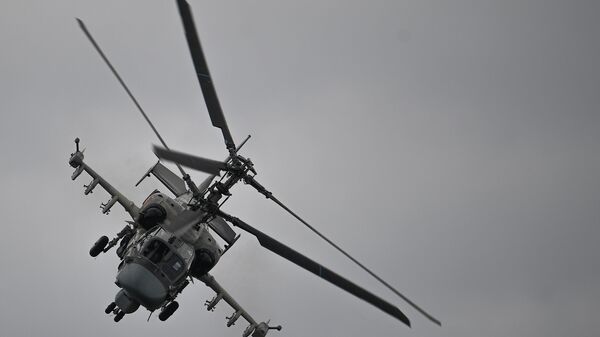 Ударный вертолет Ка-52 Аллигатор выполняет демонстрационный полет в рамках Международного форума Армия-2020 на аэродроме Кубинка в Подмосковье - Sputnik Արմենիա