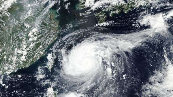 Вид из космоса на тайфун Майсак, проходящий над Японией - Sputnik Արմենիա