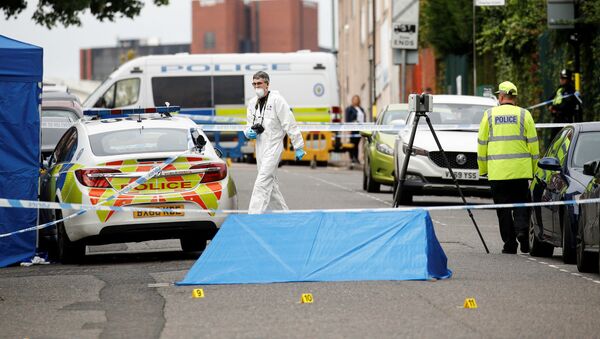 Офицеры полиции и судебно-медицинский работник на месте нападений в Бирмингеме (6 сентября 2020). Великобритания - Sputnik Արմենիա