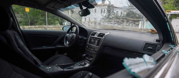 Поврежденный от обстрелов автомобиль в Гадруте Поврежденный от обстрелов автомобиль в Гадруте - Sputnik Արմենիա