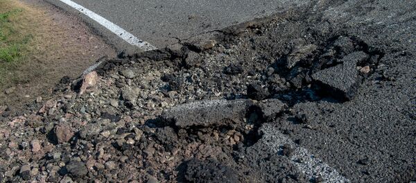 Разрушения на улице в Мартакерте во время артобстрелов (29 сентября 2020). Карабах - Sputnik Արմենիա