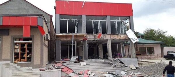 Последствия обстрелов мирных кварталов города Мартакерт (30 сентября 2020). Карабах - Sputnik Արմենիա