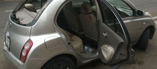 Машина журналистов, которые попали под обстрел в Мартуни в Карабахе - Sputnik Армения