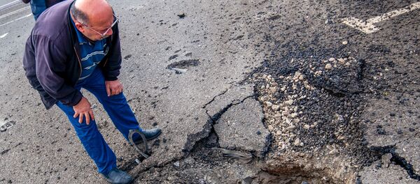 Последствия обстрелов Степанакерта (2 октября 2020). Карабах Последствия обстрелов Степанакерта (2 октября 2020). Карабах - Sputnik Армения