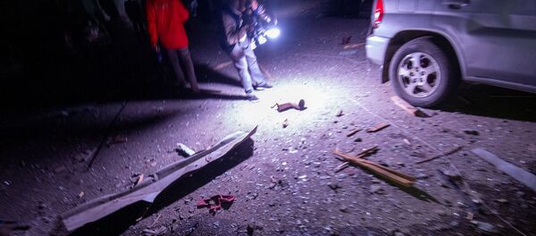 Последствия обстрелов в Степанакерта после вечерних обстрелов (2 октября 2020). Карабах - Sputnik Армения