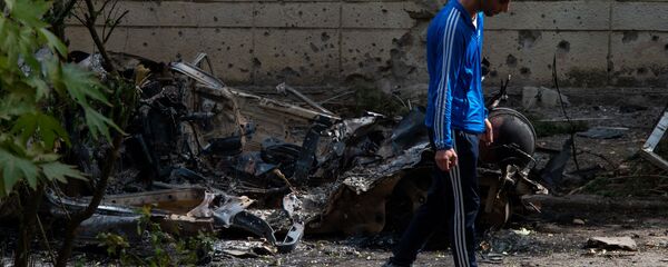 Последствия обстрелов в Мартуни (2 октября 2020). Карабах - Sputnik Армения