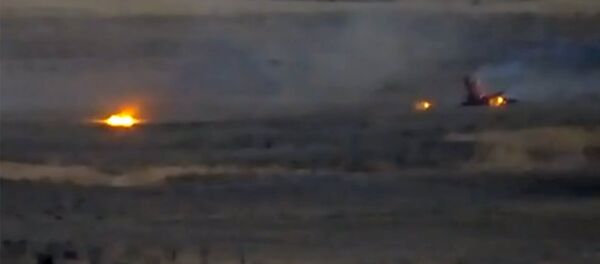 ВС Армении подбивают азербайджанский беспилотный летательный аппарат. Кадр из видео - Sputnik Армения