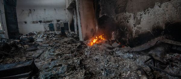 Кадры горящего магазина после ночного ракетного обстрела (4 октября 2020). Степанакерт - Sputnik Արմենիա