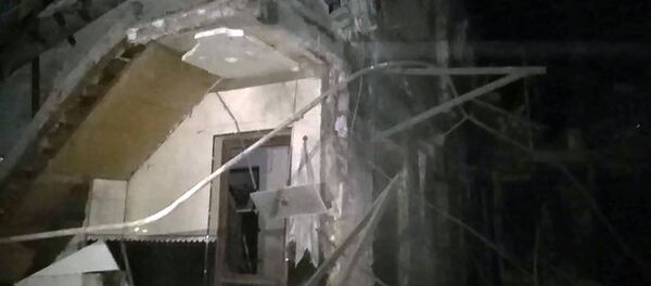 Обрушенное здание после ночных обстрелов (6 октября 2020). Степанакерт - Sputnik Արմենիա