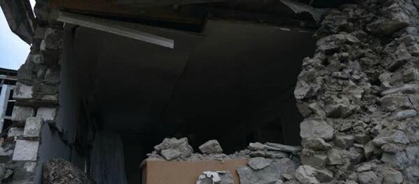 Последствия ночного обстрела (8 октября 2020). Степанакерт Последствия ночного обстрела (8 октября 2020). Степанакерт - Sputnik Армения