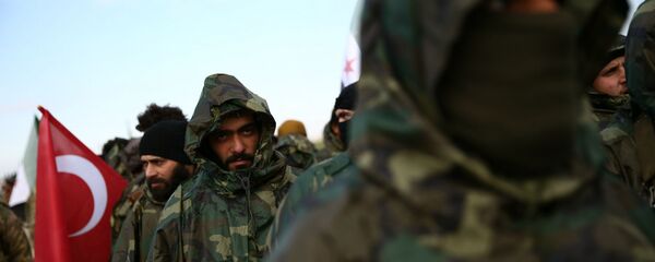 Поддерживаемые Турцией сирийские боевики собираются во время военных учений на севере провинции Алеппо (29 декабря 2018). Сирия - Sputnik Армения
