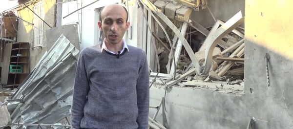 Кадр из видеообращения защитника прав человека Карабаха Артака Бегларяна после обстрелов рынка Степанакерта (31 октября 2020). Карабах Кадр из видеообращения защитника прав человека Карабаха Артака Бегларяна после обстрелов рынка Степанакерта (31 октября 2020). Карабах - Sputnik Արմենիա