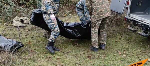 Ինչպես են դուրս բերվում դիակները մարտական գործողությունների վայրից - Sputnik Армения