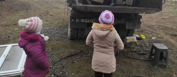 Жители села Нор Марага Мартакертского района Карабаха покидают свои дома перед сдачей территорий азербайджанской стороне (19 ноября 2020). Карабах - Sputnik Արմենիա