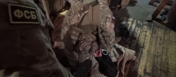 Кадры спецоперации: ФСБ ликвидировала ячейку террористов, готовивших теракты в Москве - Sputnik Армения