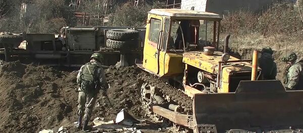 Разминирование местности и восстановление линий электропередач в Нагорном Карабахе Разминирование местности и восстановление линий электропередач в Нагорном Карабахе - Sputnik Армения