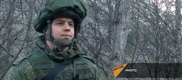 Командир группы разминирования, капитан Виталий Мороз на боевом дежурстве Командир группы разминирования, капитан Виталий Мороз на боевом дежурстве - Sputnik Արմենիա