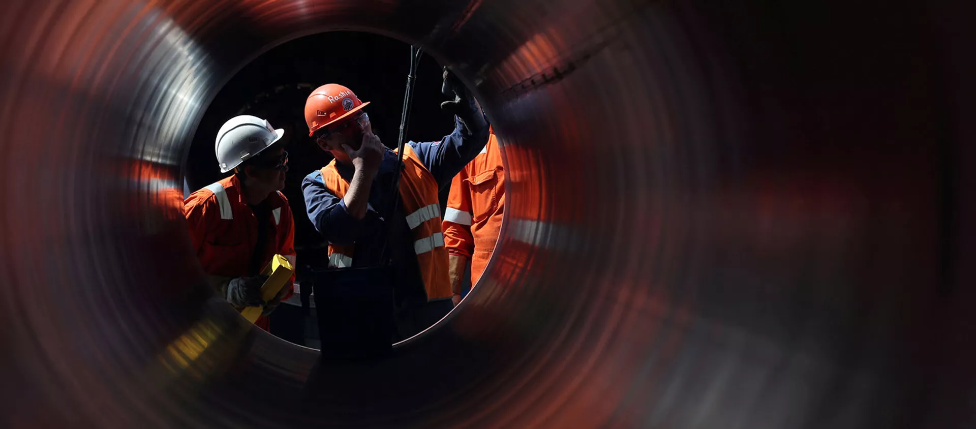Рабочие на строительной площадке газопровода Северный поток-2, недалеко от города Кингисепп (5 июня 2019). Ленинградская область - Sputnik Армения, 1920, 12.02.2021