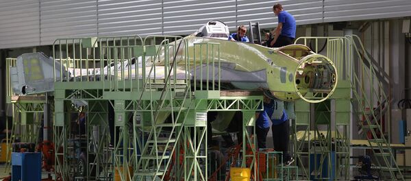 Сотрудники Российской самолетостроительной корпорации «МиГ» во время работы (14 июля 2017). Жуковский - Sputnik Армения