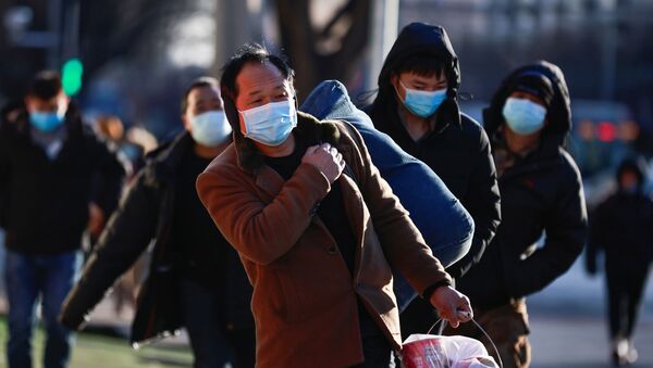 Люди в масках на улицах Пекина - Sputnik Армения