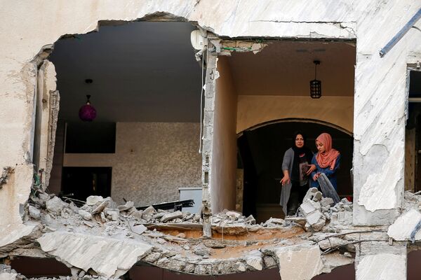 Պաղեստինցիները  տունը վնասվել է իսրայելական ավիահարվածի հետևանքով։ - Sputnik Արմենիա