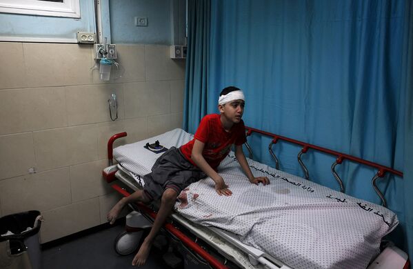 Պաղեստինցի վիրավոր տղան` Աշ Շաթի հիվանդանոցում (մայիսի 15, 2021). Գազա - Sputnik Արմենիա