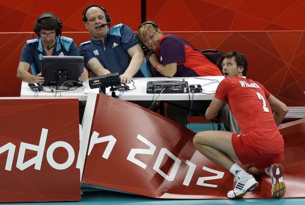 Игрок сборной Польши по волейболу во время матча против сборной Болгарии на Летних олимпийских играх в Лондоне  - Sputnik Армения