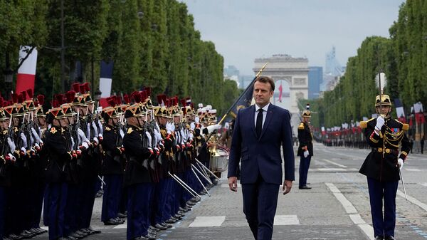 Президент Франции Эммануэль Макрон во время парада в честь Дня взятия Бастилии на Елисейских полях (14 июля 2021). Париж - Sputnik Արմենիա