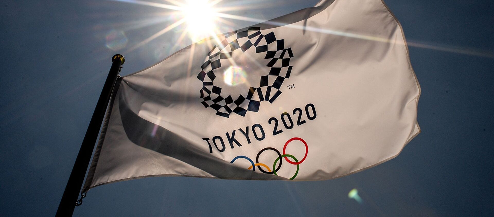 Флаг с символикой Олимпийских игр в Aomi Urban Sports Park в Токио - Sputnik Արմենիա, 1920, 22.07.2021