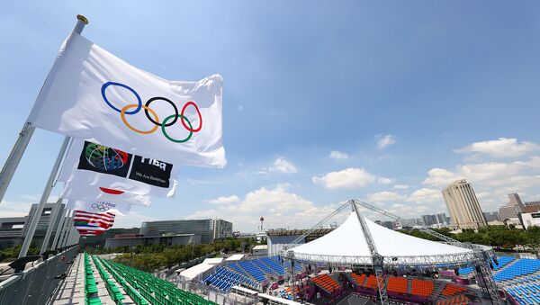 Олимпийские флаги на стадионе спортивного парка Аоми в Токио - Sputnik Արմենիա