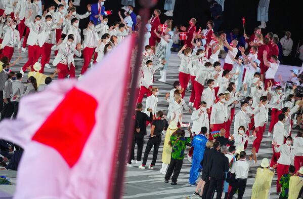 Спортсмены сборной Японии во время парада атлетов на церемонии открытия XXXII летних Олимпийских игр (23 июля 2021). Токио - Sputnik Армения