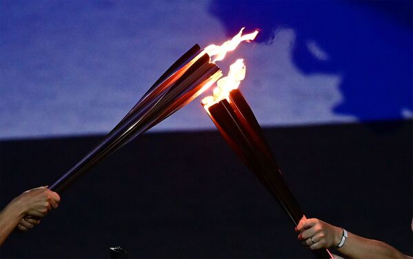 Օլիմպիական կրակի վառման արարողությունը՝ խաղերի բացման ժամանակ - Sputnik Արմենիա