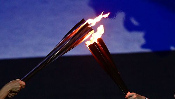 Церемония зажжения олимпийского огня во время открытия XXXII летних Олимпийских игр (23 июля 2021). Токио - Sputnik Армения
