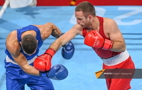 Арман Дарчинян во время поединка на Олимпийских играх в Токио (29 июля 2021). Япония - Sputnik Армения