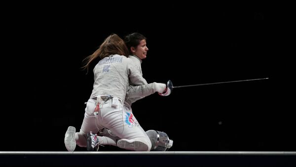 Российские спортсменки Софья Позднякова (слева) и Ольга Ниткина радуются побед - Sputnik Армения