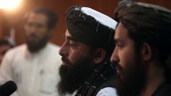 Представитель движения Талибан Забиулла Муджахид во время пресс-конференции в Кабуле (17 августа 2021). Афганистан - Sputnik Արմենիա