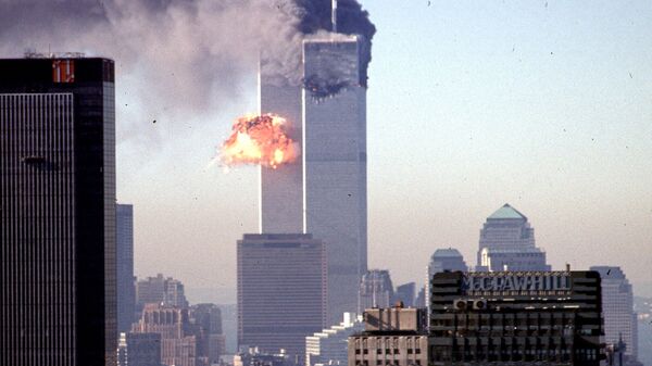 Всемирный торговый центр во время взрыва (11 сентября 2001. Нью-Йорк - Sputnik Армения