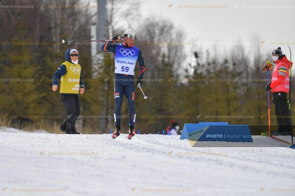 Հայ դահուկորդ Միքայել Միքայելյանը 22-րդ ձմեռային Օլիմպիական խաղերի դասական ոճով 15 կմ անհատական մրցավազքի ժամանակ (11 փետրվարի, 2022թ). Պեկին - Sputnik Արմենիա