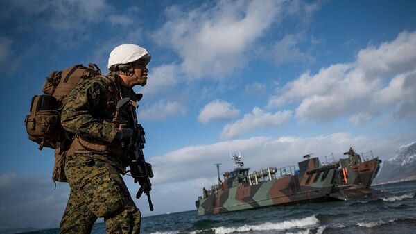 Морской пехотинец США на международных военных учениях Cold Response 22 к северу от Норвегии (21 марта 2022). Сандстранд - Sputnik Армения