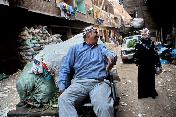 Жители города мусорщиков на окраине Каира, Египет - Sputnik Армения