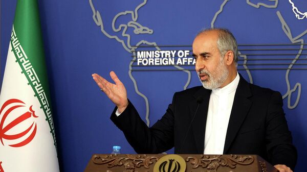 Официальный представитель МИД Ирана Насер Канани на пресс-конференции (13 июля 2022). Тегеран - Sputnik Армения