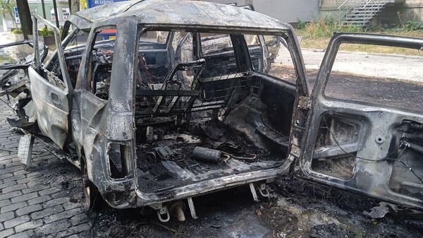 Взорванный автомобиль коменданта Бердянска - Sputnik Армения